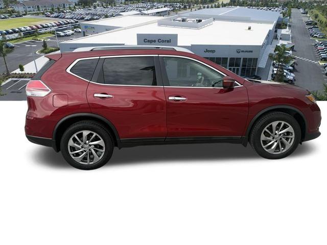 Photo of 2015 Cayenne Red Nissan Rogue