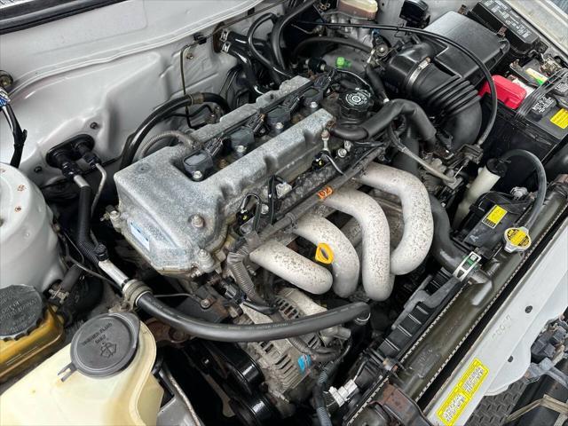 Photo of 2000 Silverstream Opal Toyota Corolla