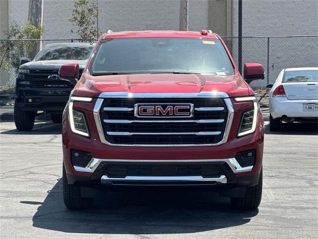 Photo of 2025 Volcanic Red Tintcoat GMC Yukon