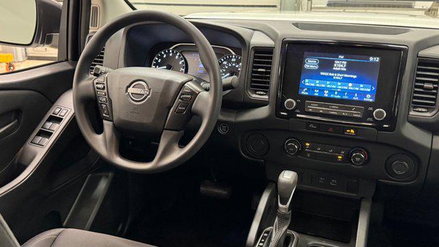 Photo of 2023 Glacier White Nissan Frontier