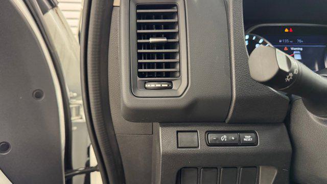 Photo of 2023 Glacier White Nissan Frontier