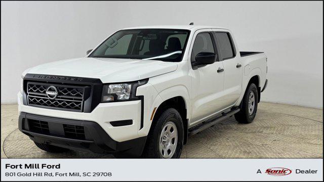 Photo of 2023 Glacier White Nissan Frontier