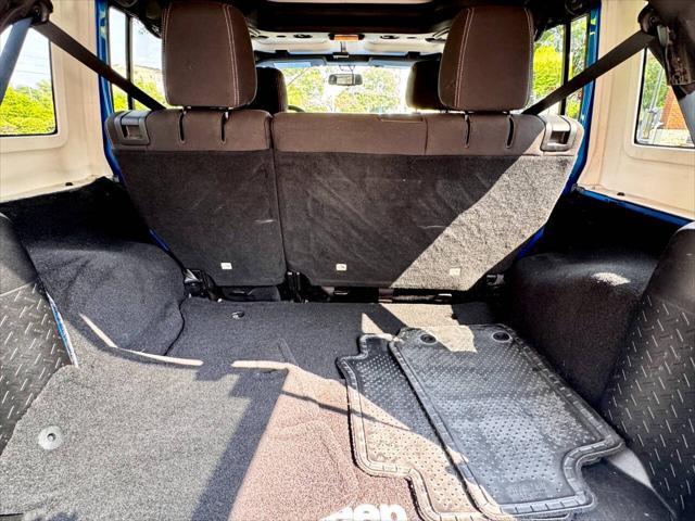 Photo of 2015 Hydro Blue Pearl Jeep Wrangler Unlimited