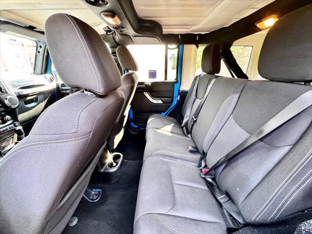 Photo of 2015 Hydro Blue Pearl Jeep Wrangler Unlimited