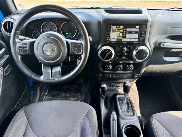 Photo of 2015 Hydro Blue Pearl Jeep Wrangler Unlimited