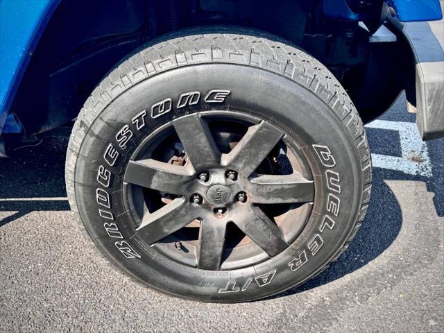 Photo of 2015 Hydro Blue Pearl Jeep Wrangler Unlimited