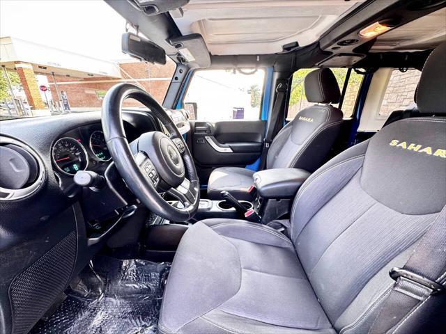 Photo of 2015 Hydro Blue Pearl Jeep Wrangler Unlimited