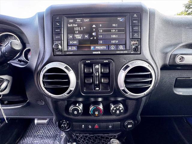 Photo of 2015 Hydro Blue Pearl Jeep Wrangler Unlimited