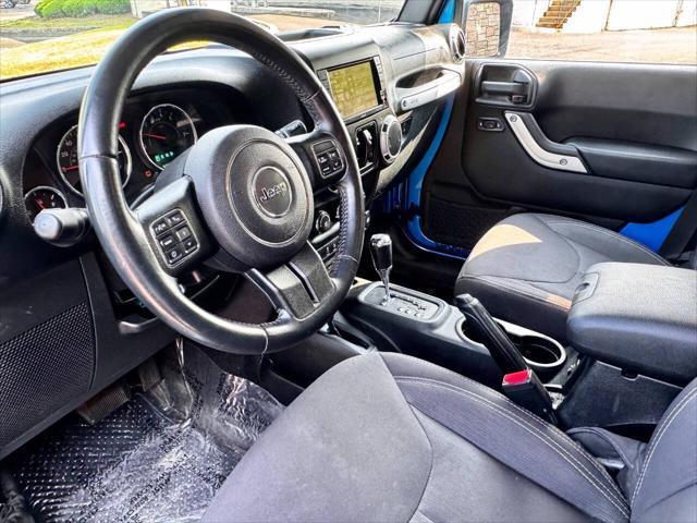Photo of 2015 Hydro Blue Pearl Jeep Wrangler Unlimited