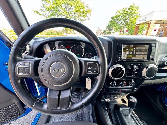 Photo of 2015 Hydro Blue Pearl Jeep Wrangler Unlimited