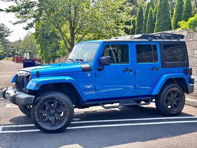 Photo of 2015 Hydro Blue Pearl Jeep Wrangler Unlimited