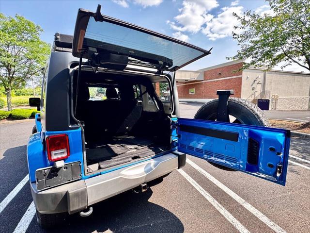 Photo of 2015 Hydro Blue Pearl Jeep Wrangler Unlimited