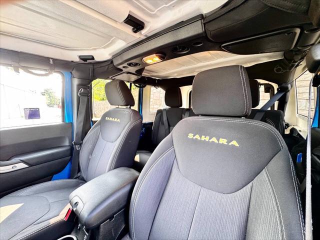 Photo of 2015 Hydro Blue Pearl Jeep Wrangler Unlimited