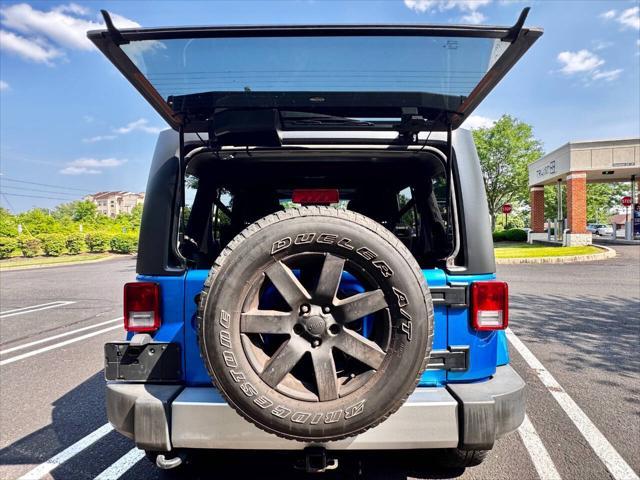 Photo of 2015 Hydro Blue Pearl Jeep Wrangler Unlimited