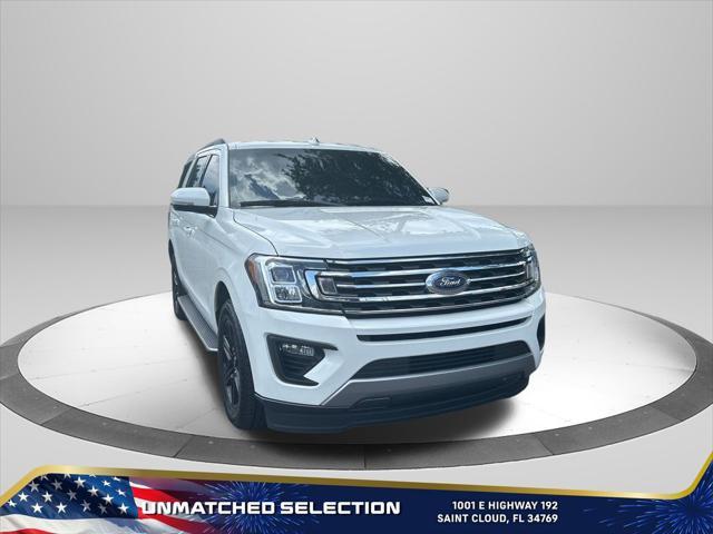 Photo of 2021 STAR WHITE MET TRI-COAT Ford Expedition