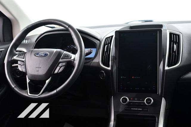 Photo of 2022 Atlas Blue Metallic Ford Edge