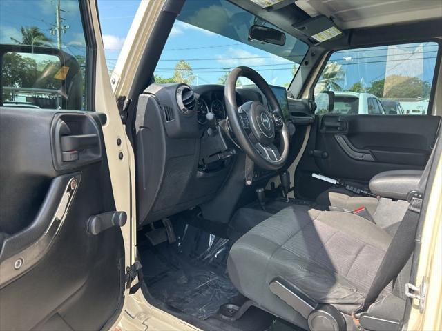 Photo of 2011 Sahara Tan Clearcoat Jeep Wrangler Unlimited