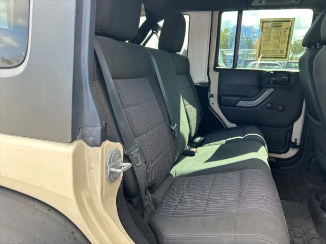 Photo of 2011 Sahara Tan Clearcoat Jeep Wrangler Unlimited