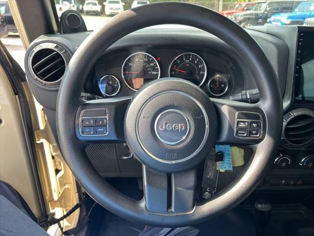 Photo of 2011 Sahara Tan Clearcoat Jeep Wrangler Unlimited
