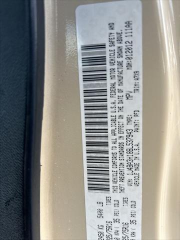 Photo of 2011 Sahara Tan Clearcoat Jeep Wrangler Unlimited