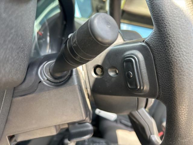Photo of 2011 Sahara Tan Clearcoat Jeep Wrangler Unlimited