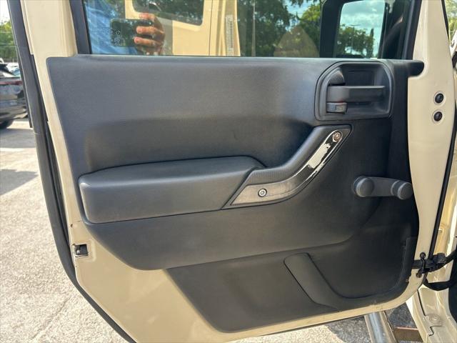 Photo of 2011 Sahara Tan Clearcoat Jeep Wrangler Unlimited