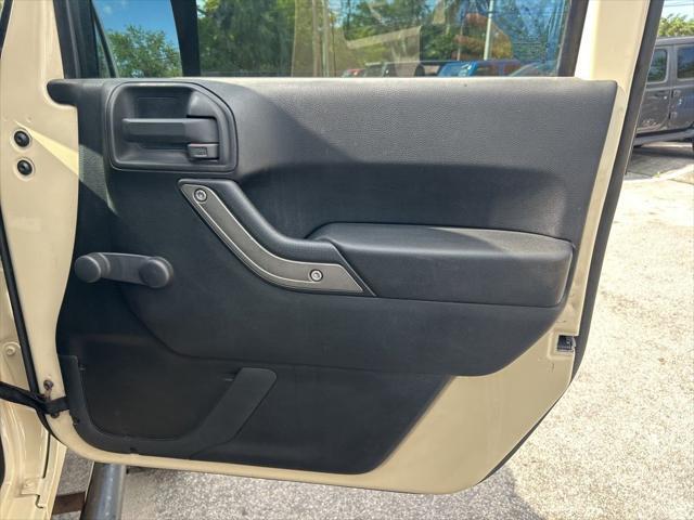 Photo of 2011 Sahara Tan Clearcoat Jeep Wrangler Unlimited