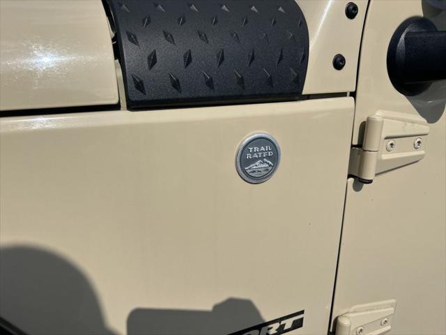 Photo of 2011 Sahara Tan Clearcoat Jeep Wrangler Unlimited