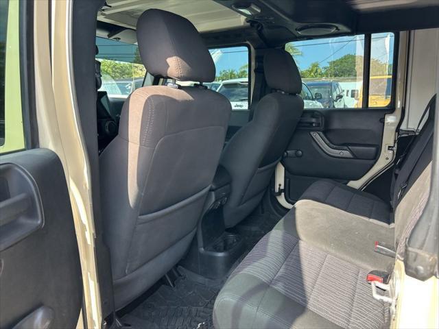 Photo of 2011 Sahara Tan Clearcoat Jeep Wrangler Unlimited