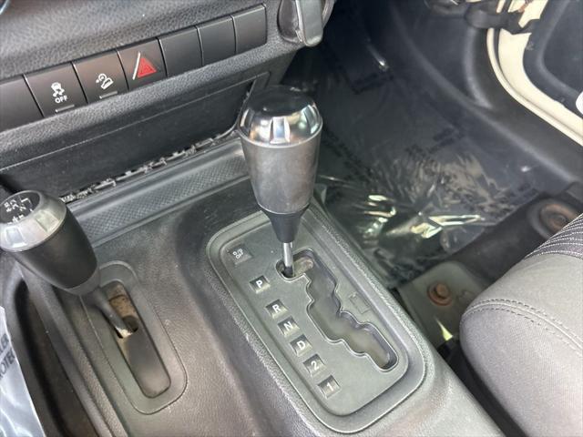 Photo of 2011 Sahara Tan Clearcoat Jeep Wrangler Unlimited