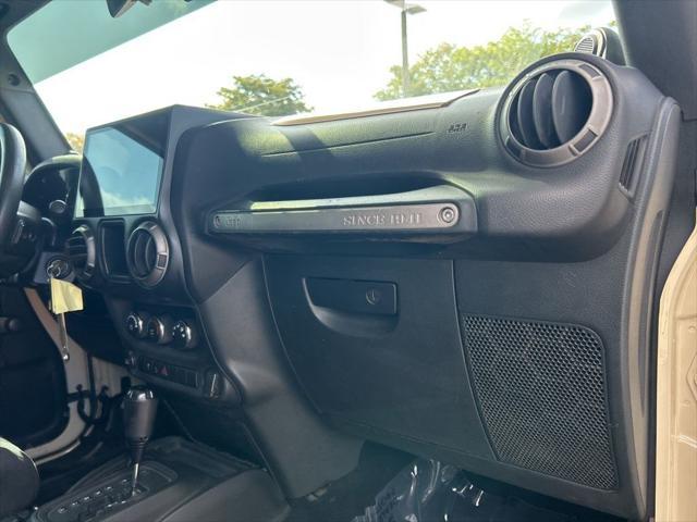 Photo of 2011 Sahara Tan Clearcoat Jeep Wrangler Unlimited
