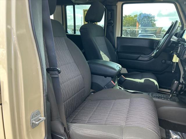 Photo of 2011 Sahara Tan Clearcoat Jeep Wrangler Unlimited
