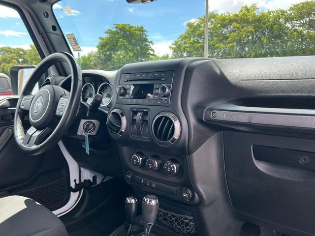 Photo of 2018 Bright White Clearcoat Jeep Wrangler JK