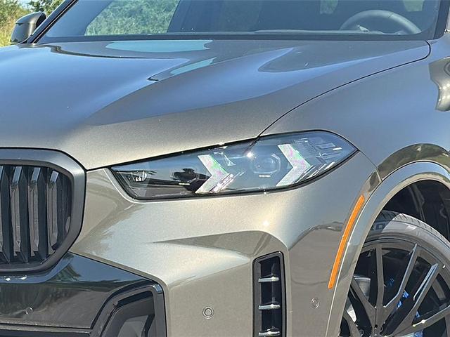 Photo of 2026 Manhattan Green Metallic BMW X5