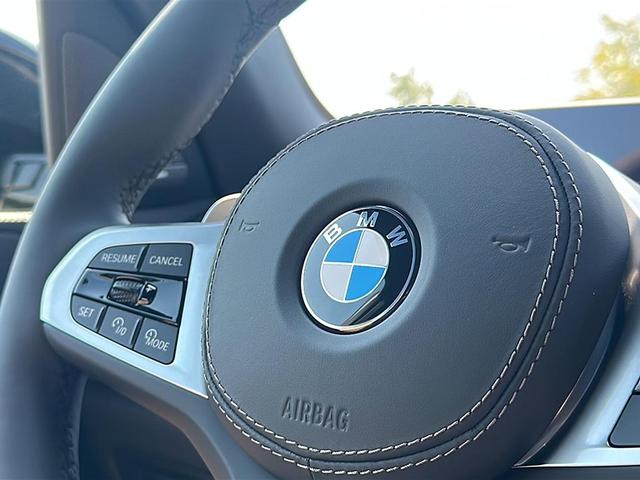 Photo of 2026 Manhattan Green Metallic BMW X5