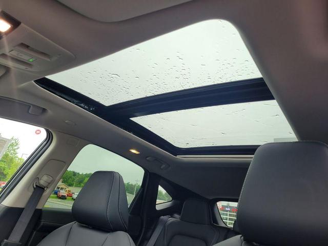 Photo of 2025 2t Tel Blk Roof Nissan Murano