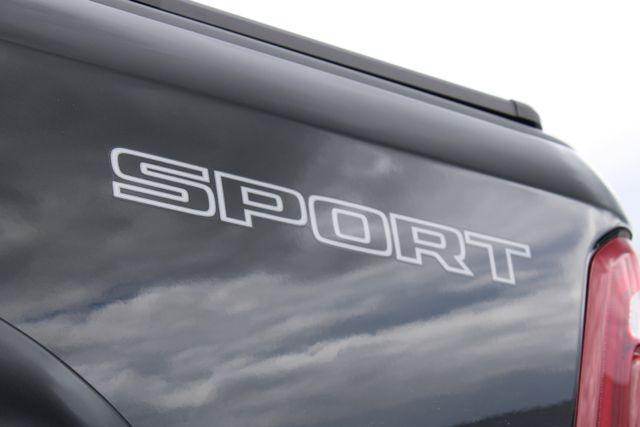 Photo of 2023 Diamond Black Crystal Pearlcoat RAM 1500