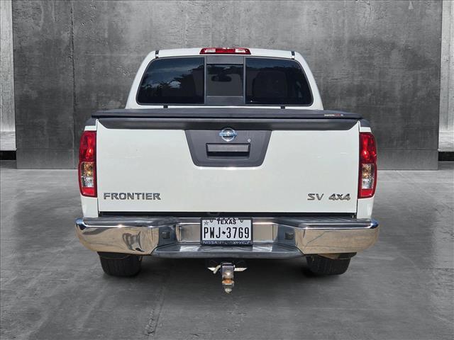 Photo of 2021 Glacier White Nissan Frontier