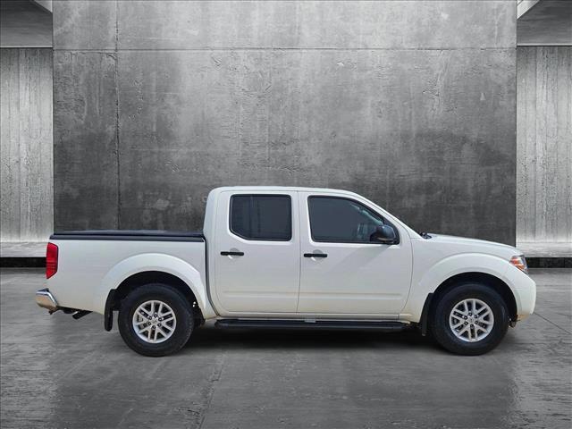 Photo of 2021 Glacier White Nissan Frontier