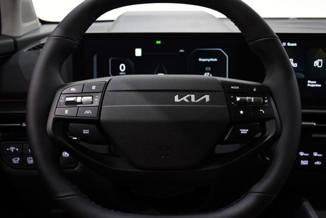 Photo of 2026 Wolf Gray Kia Sportage Hybrid