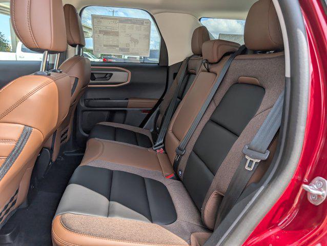 Photo of 2025 Ruby Red Metallic Tinted Clearcoat Ford Bronco Sport
