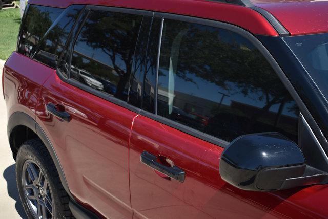 Photo of 2025 Ruby Red Metallic Tinted Clearcoat Ford Bronco Sport