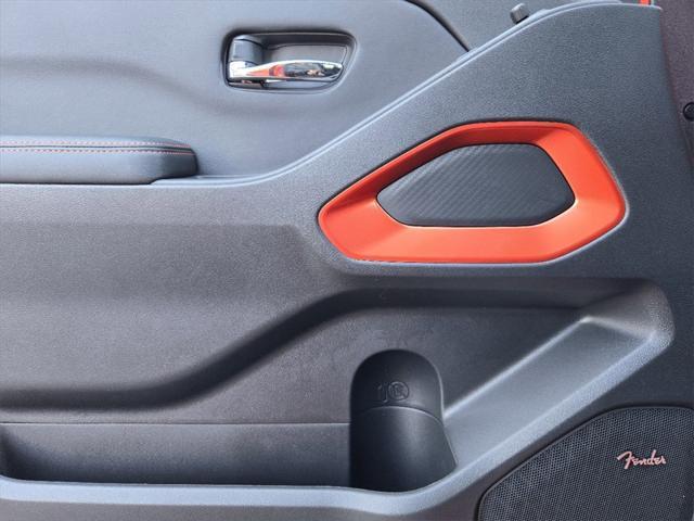 Photo of 2025 Afterburn Orange Nissan Frontier