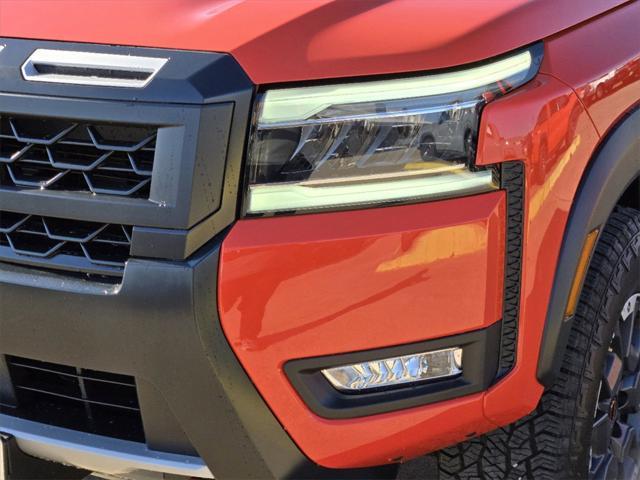 Photo of 2025 Afterburn Orange Nissan Frontier