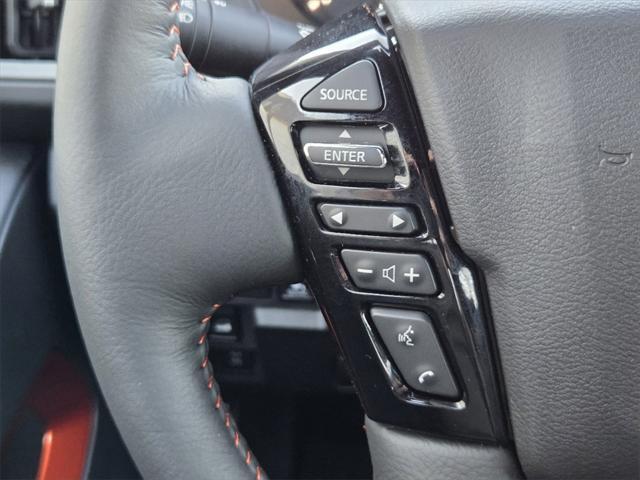 Photo of 2025 Afterburn Orange Nissan Frontier