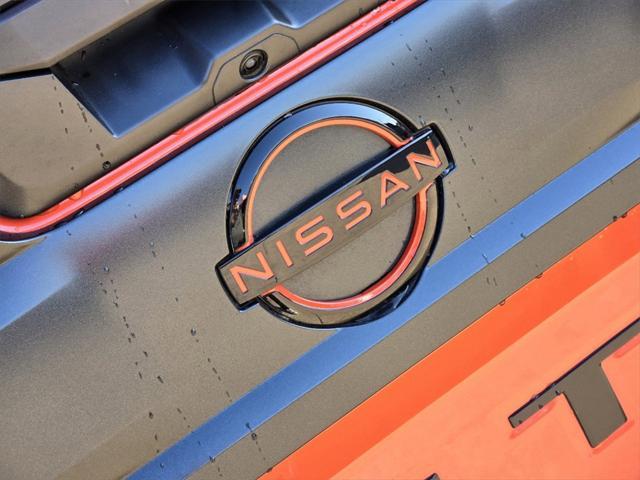Photo of 2025 Afterburn Orange Nissan Frontier