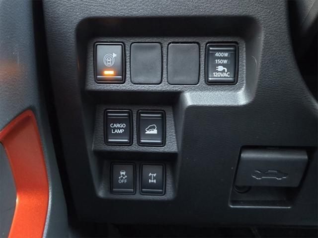 Photo of 2025 Afterburn Orange Nissan Frontier