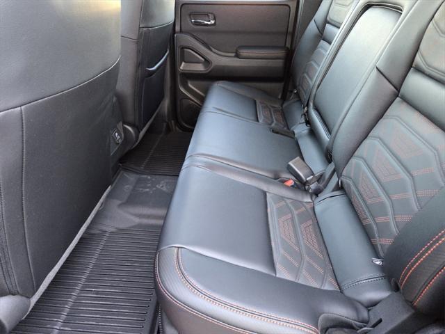Photo of 2025 Afterburn Orange Nissan Frontier