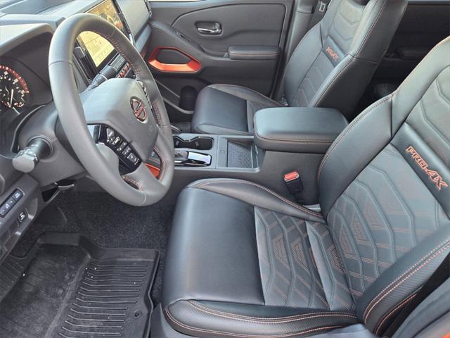 Photo of 2025 Afterburn Orange Nissan Frontier