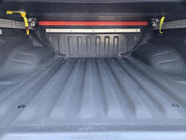 Photo of 2025 Afterburn Orange Nissan Frontier